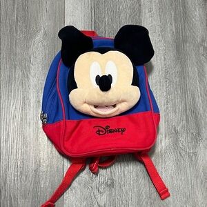 Disney Mickey Mouse plush backpack featuring a plush character face / small